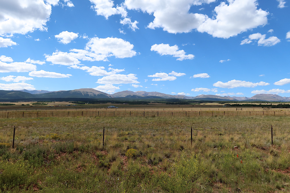 Fields and mountains.