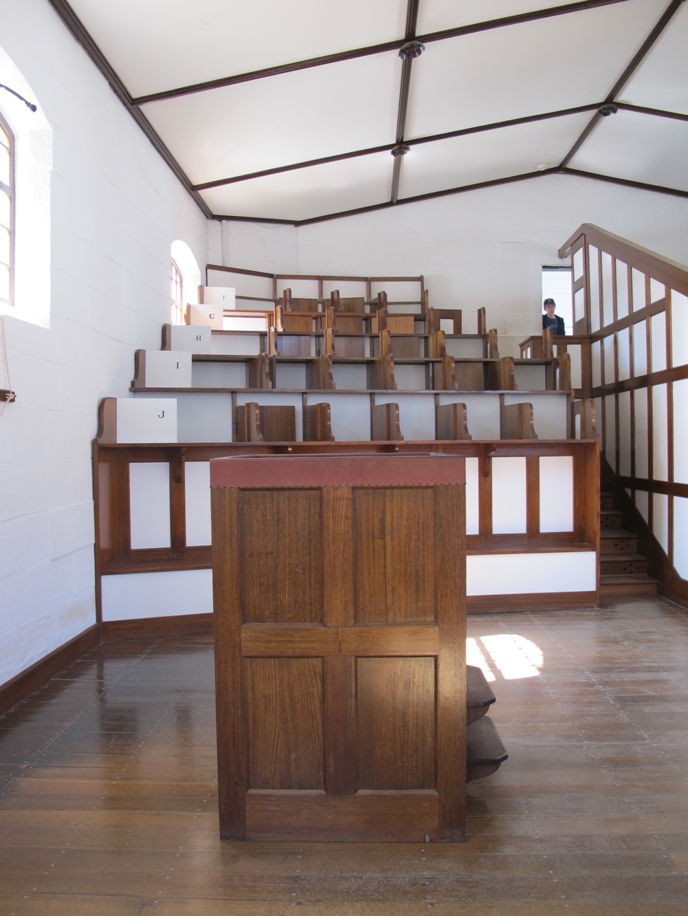 From the pulpit, you could see the heads of the prisoners, one in each little cubby.