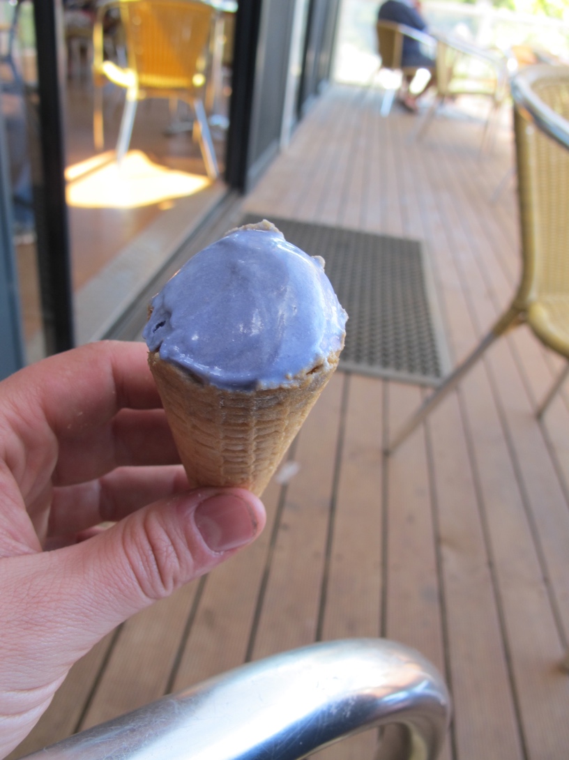 Half a lavender ice cream cone.