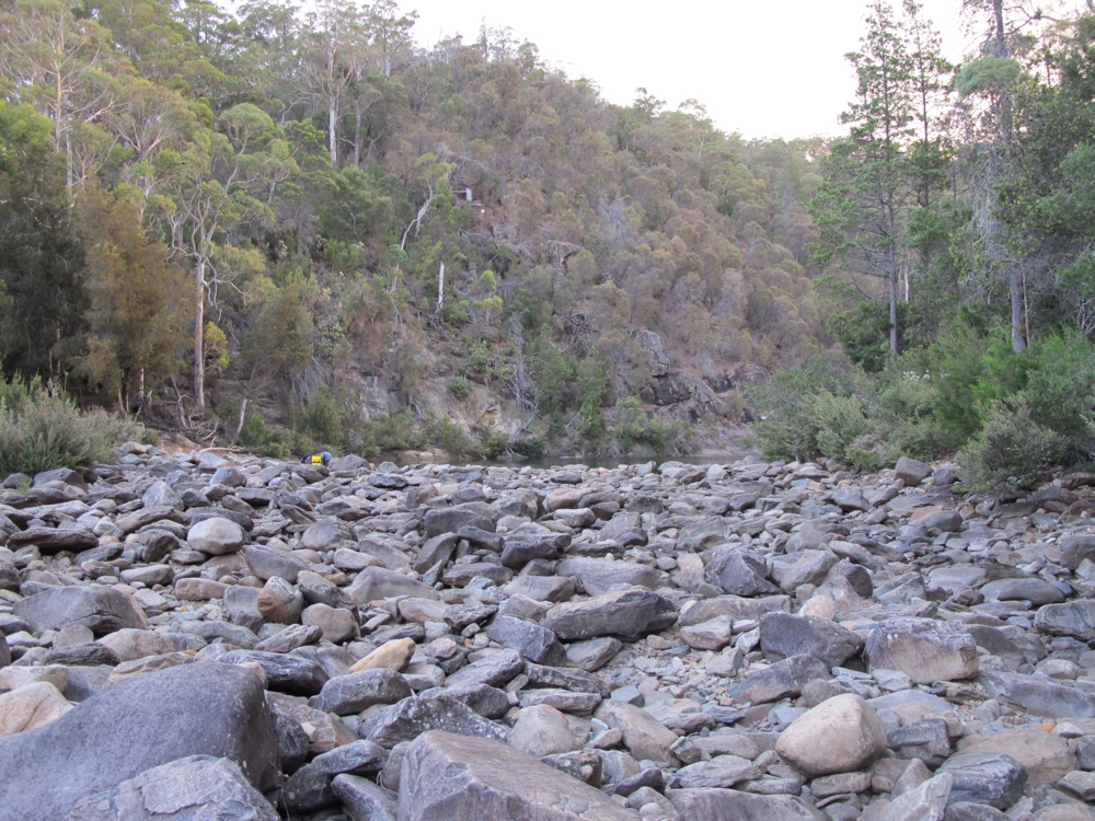 The river is in amongst those rocks on the right somewhere.