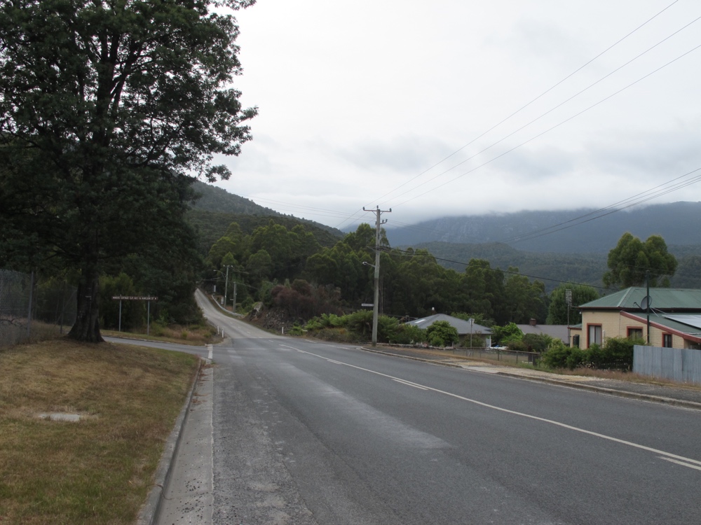 Leaving Rosebery the clouds were hiding the top of the hills, but the road went definitively up.